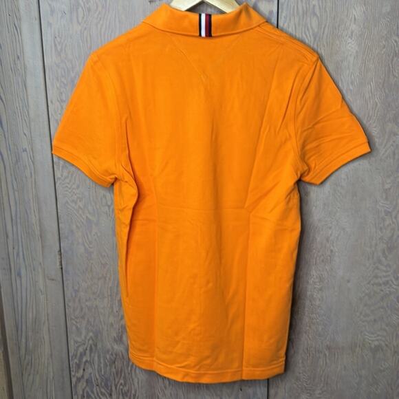 NWT Men’s Tommy Hilfiger Orange With Navy Blue Logo Polo Shirt Size X-Small - Picture 2 of 5